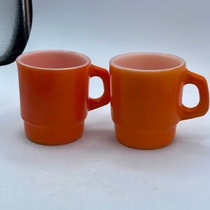 Lot of 2 Anchor Hocking  Orange stacking mugs.